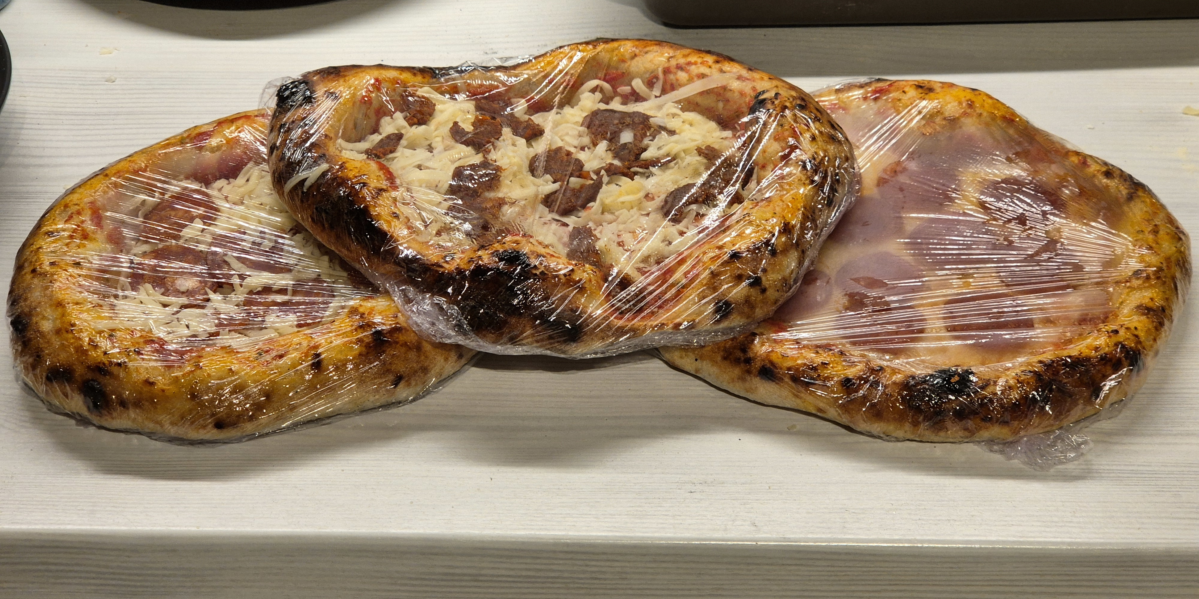 The final stack of pizzas prior to freezing.